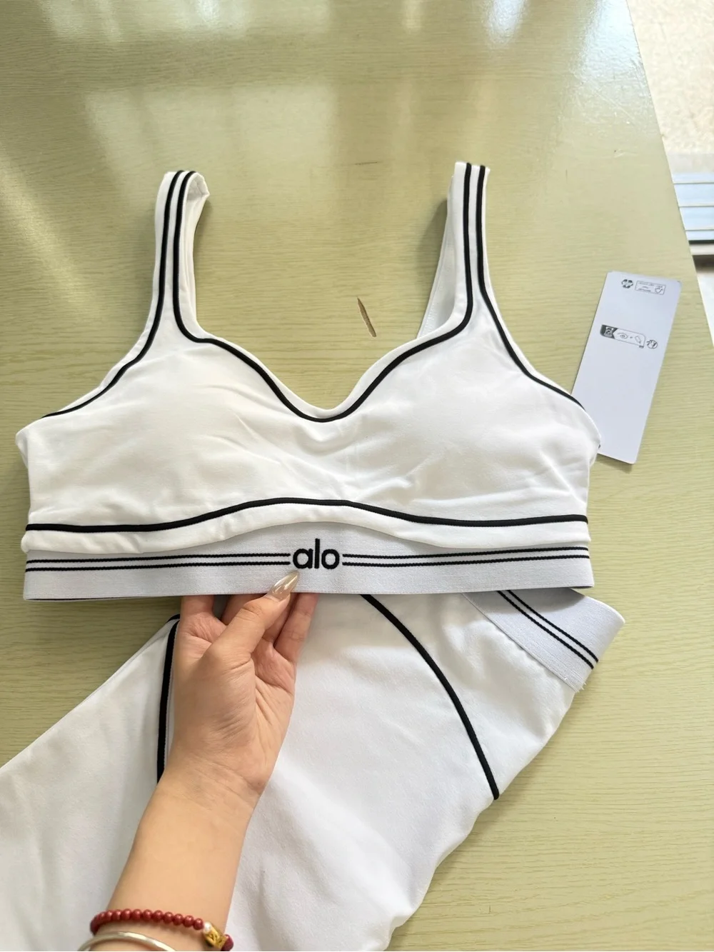 ALO Yoga White Sports Bra & Matching Shorts with Black Seam Detail